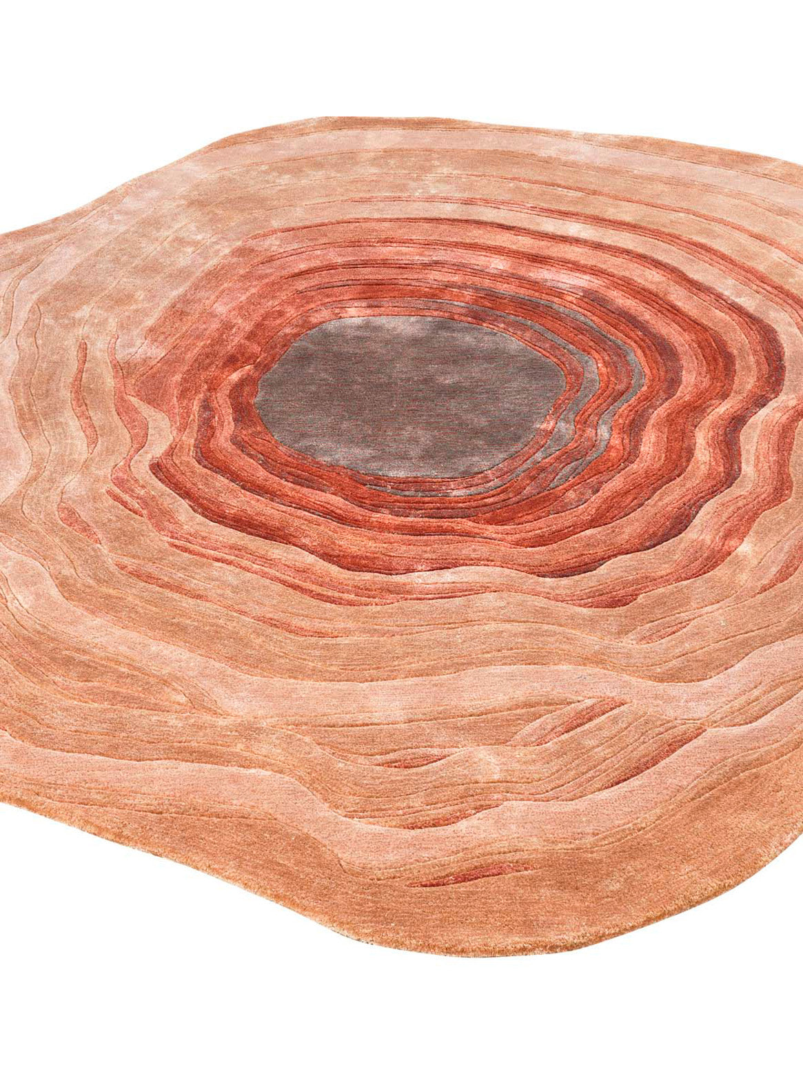 Luxury hand tufted carpet made from Botanical Silk in coral color and 7'1" x 8' size