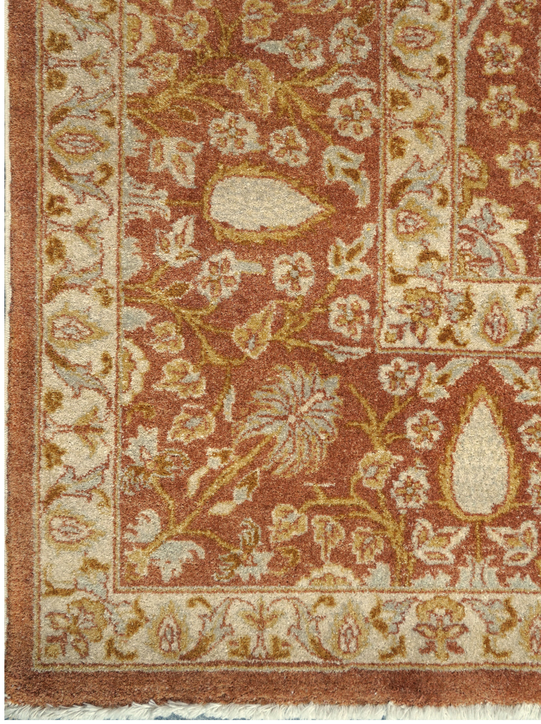 Luxury hand knotted carpet made from 100% Wool in rust color and 8' x 10' size