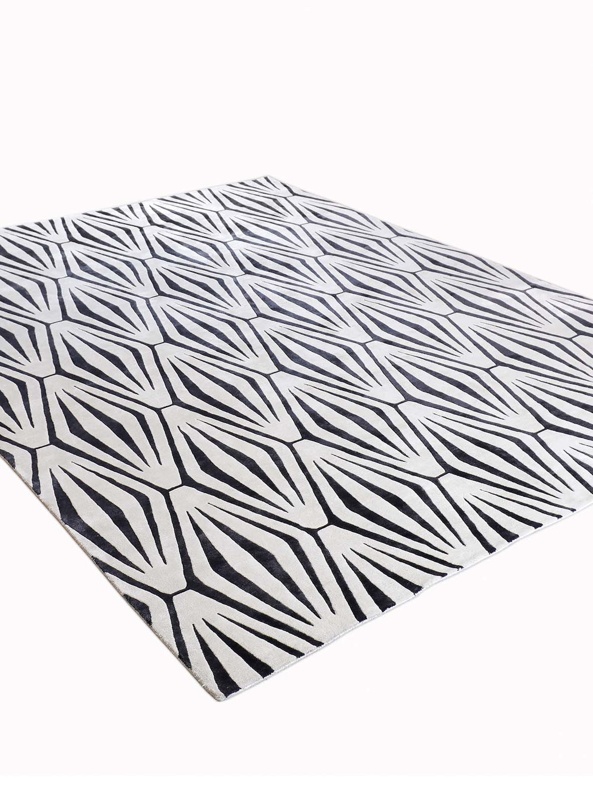 Luxury hand knotted carpet made from Botanical Silk in black & white color and 5'6" x 8' size