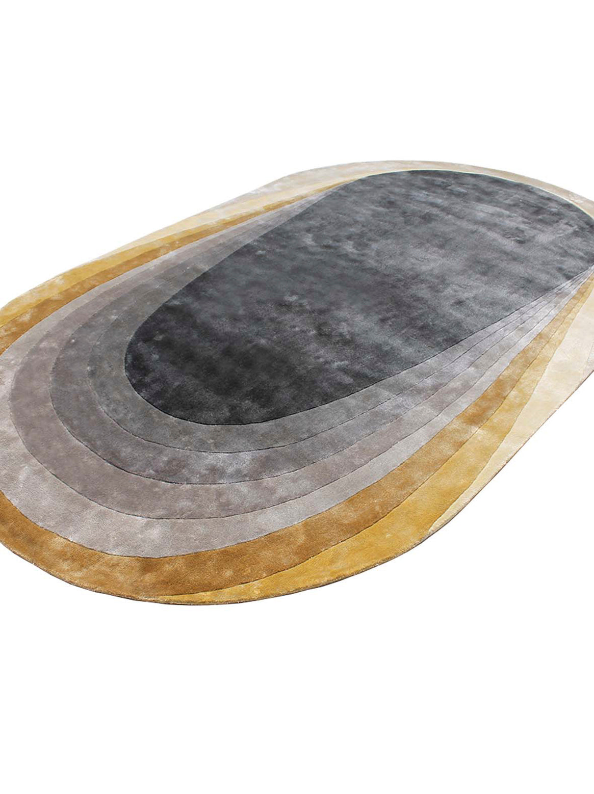 Luxury hand tufted carpet made from 100% Botanical Silk in gold color and 5'6" x 9' size