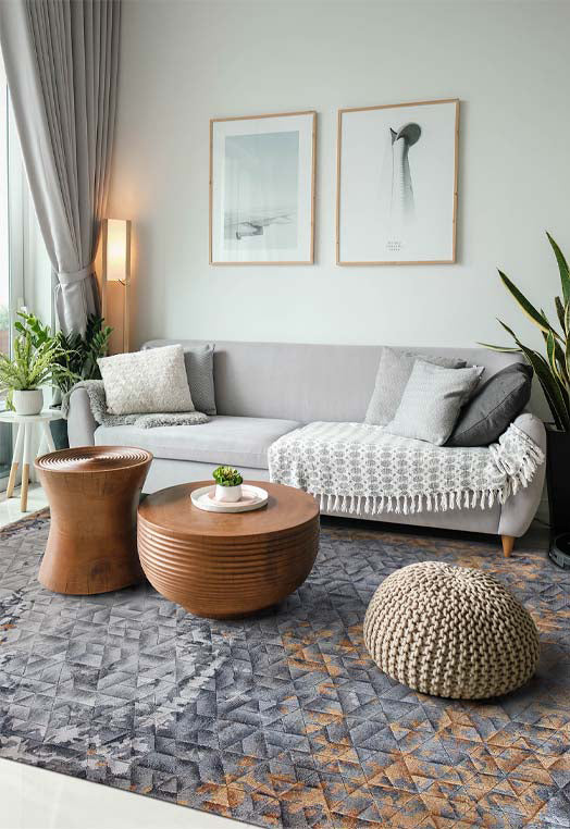 Luxury carpet in Rust Grey color and 5'6" x 8' size