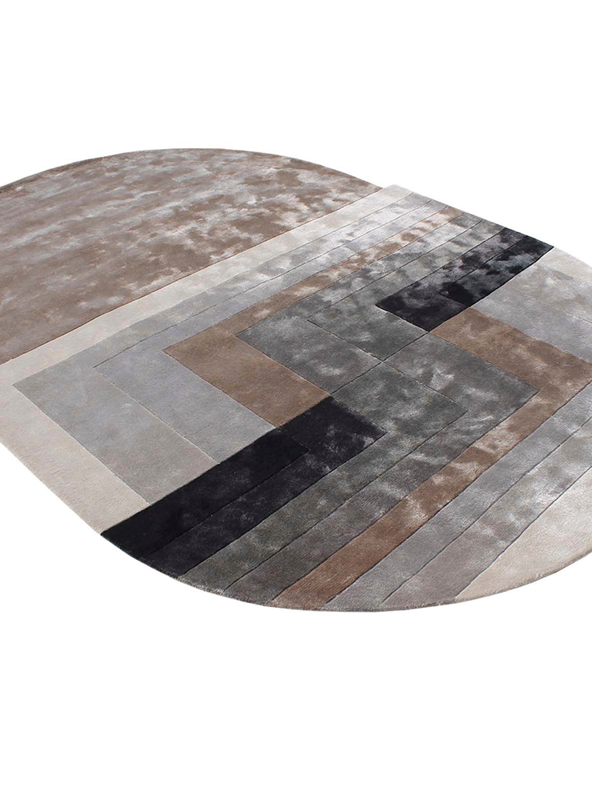 Luxury hand tufted carpet made from 100% Botanical Silk in taupe color and 5'6" x 8' size