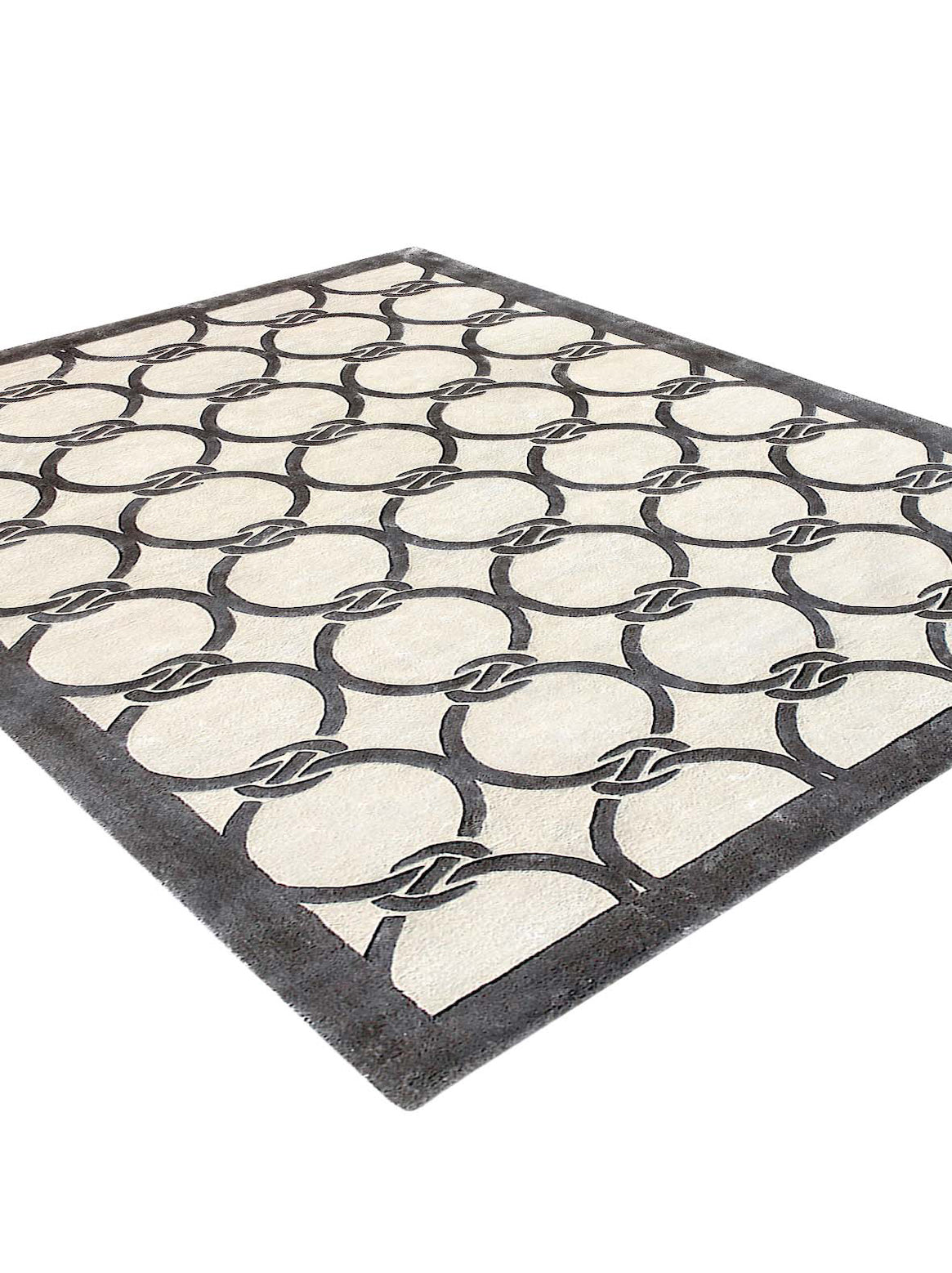 Luxury hand tufted carpet made from 100% Botanical Silk in ivory color and 4'6" x 6'6" size