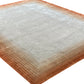 Luxury carpet in Rust color and 6' x 9' size
